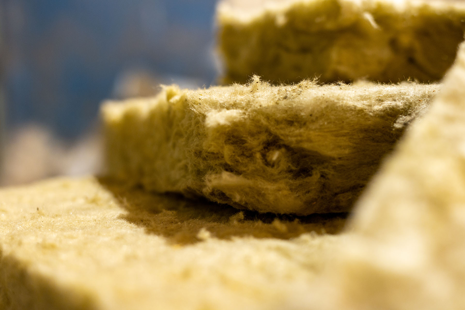 Package of thermal insulation material, rock wool is wrapped in foil.